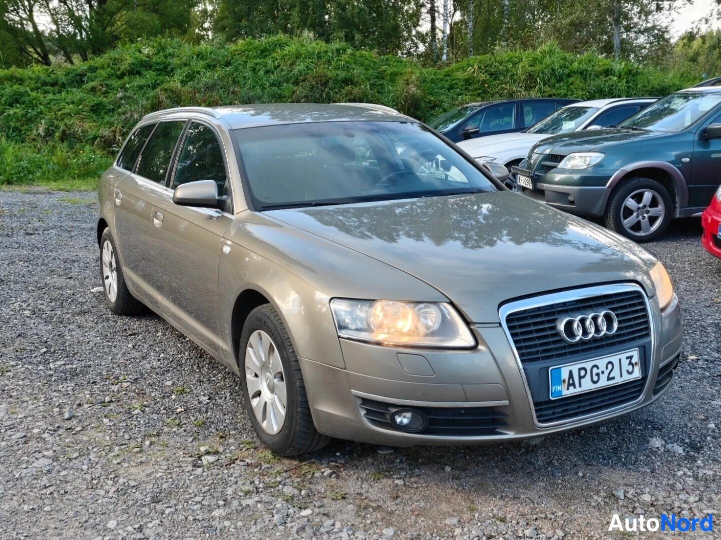 Beige Audi A6 Avant 2007, front three-quarter, nose to the right, photo 2