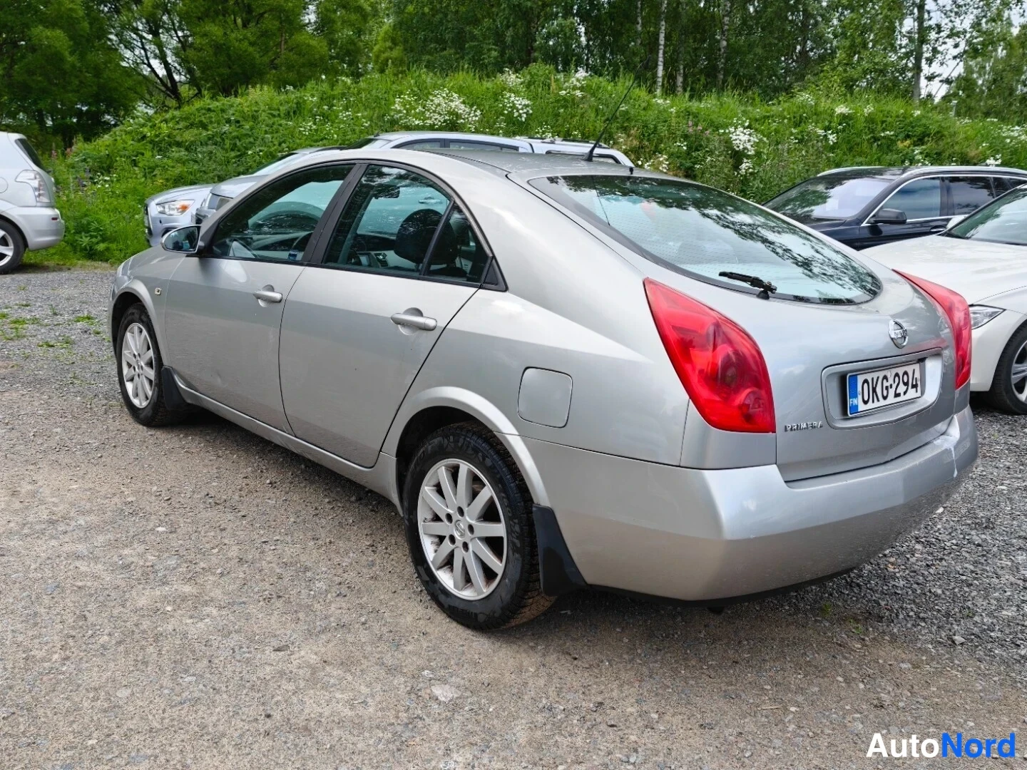 Grey Nissan Primera 2003, rear three-quarter, photo 7