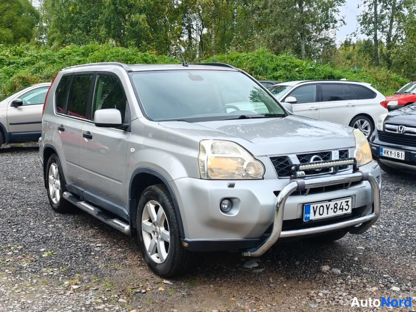 Grey Nissan X-Trail 2007, front three-quarter, nose to the right, photo 3