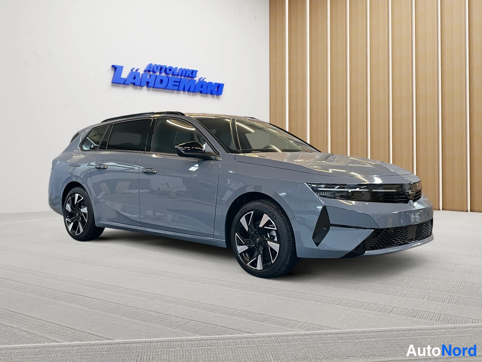 Harmaa Opel Astra 2026, etuviisto, keula oikealle, kuva 3