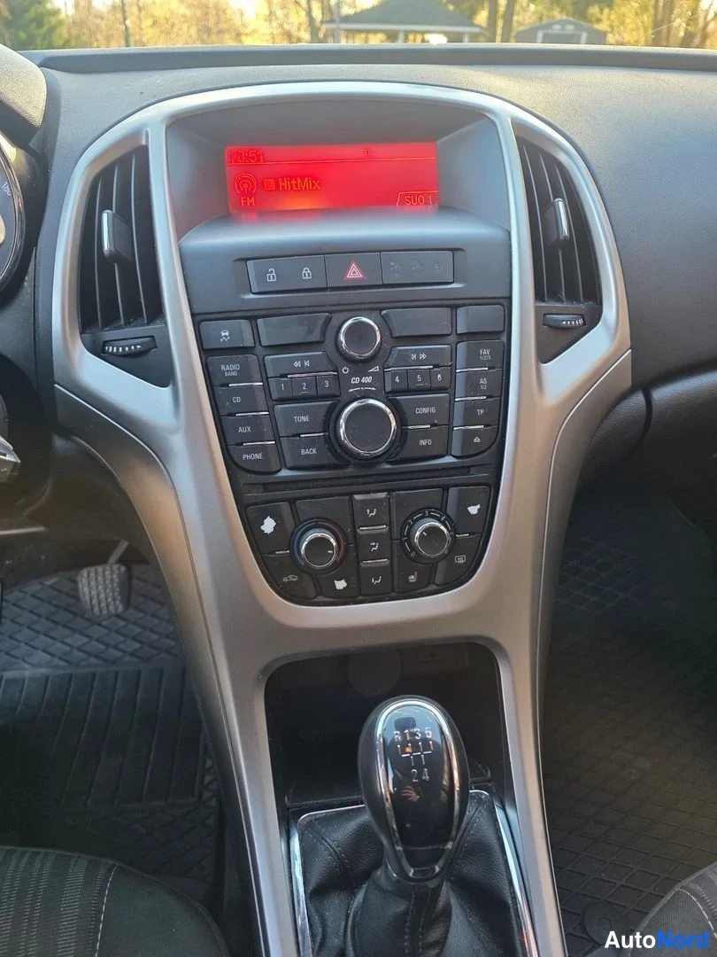 Sininen Opel Astra 2010, kuva 7