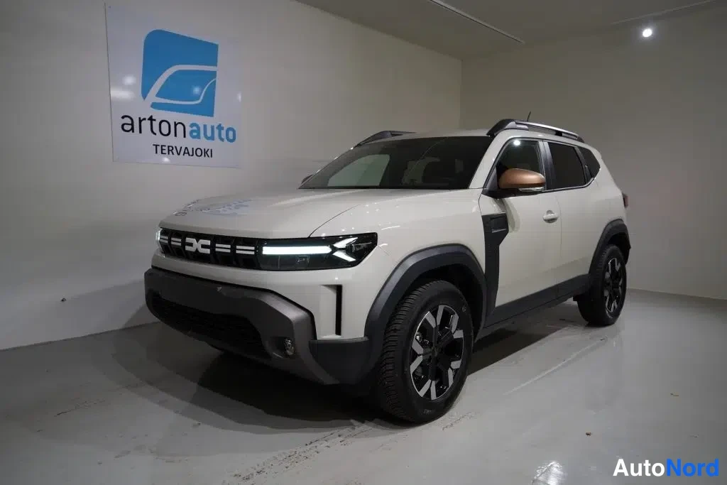 Vit Dacia Duster 2026, snett framifrån, fronten åt vänster, bild 4