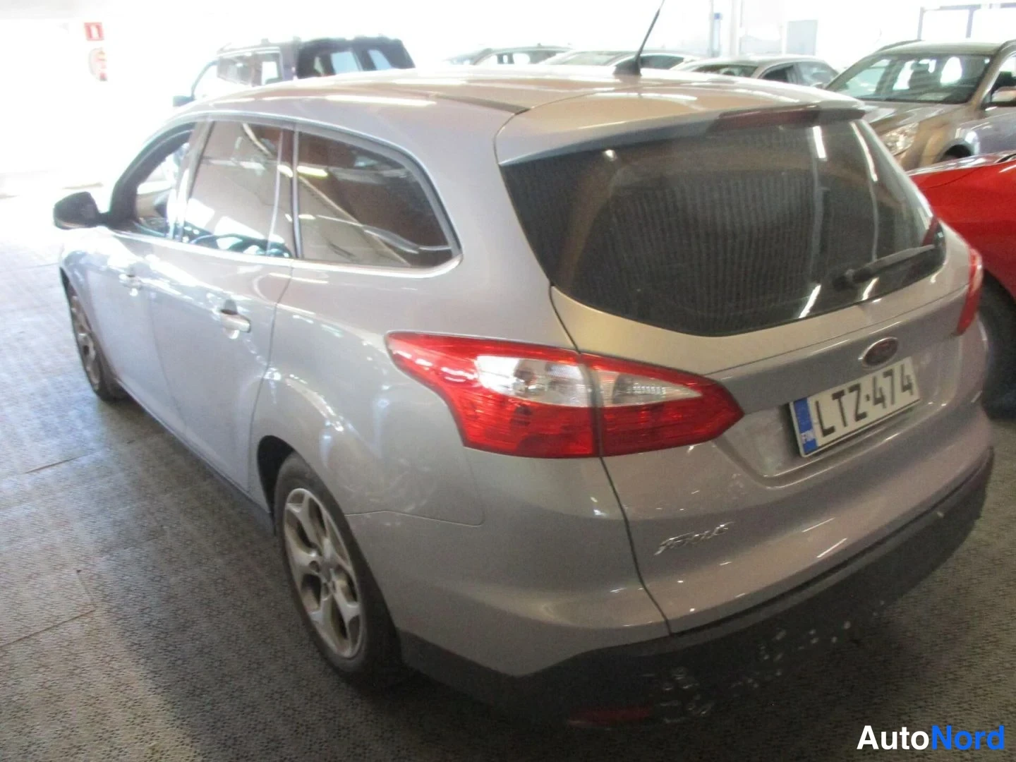 Grey Ford Focus 2013, rear three-quarter, photo 4