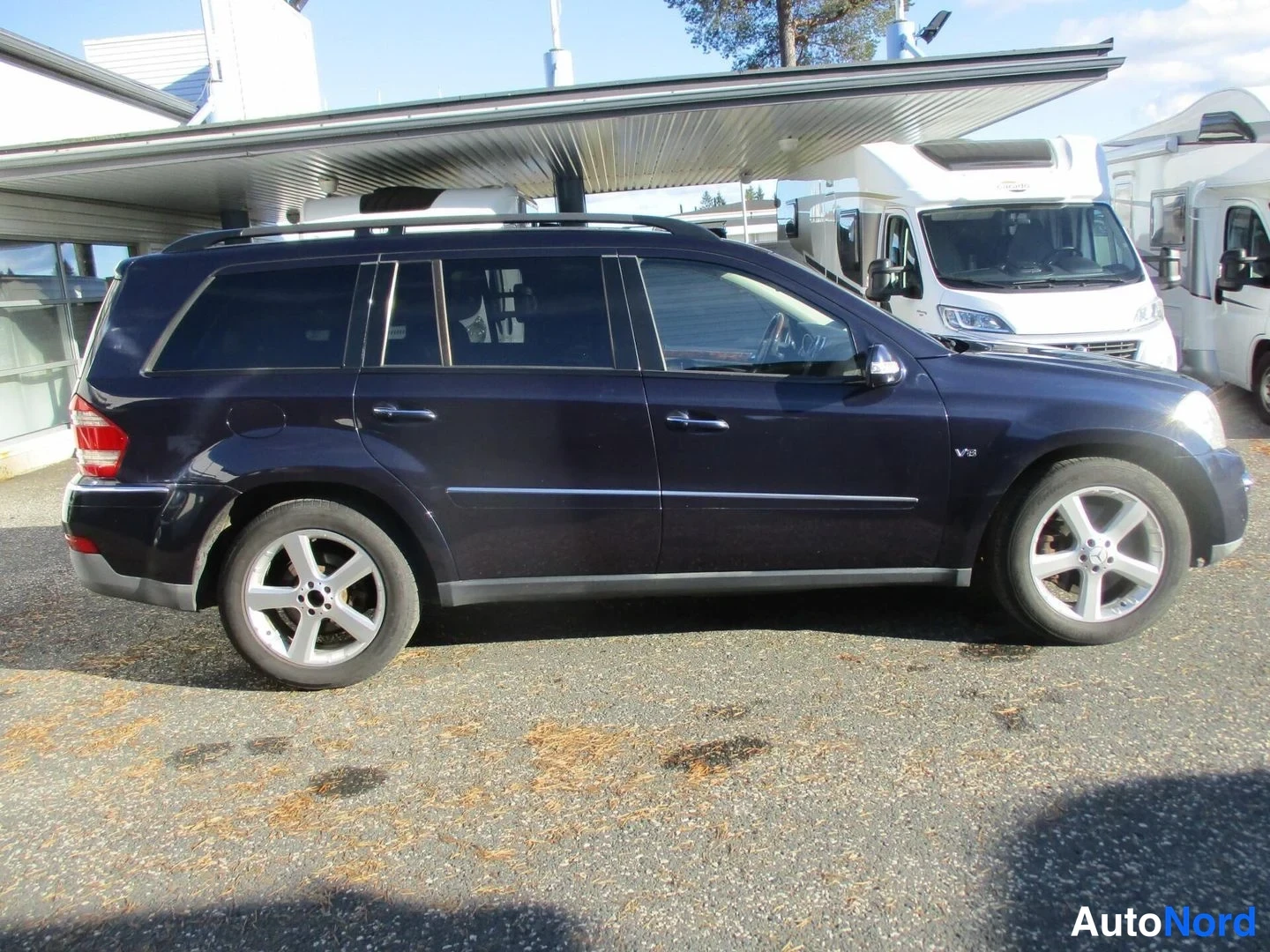 Blue Mercedes-Benz GL 420 CDI 4MATIC 2006, front three-quarter, nose to the right, photo 5
