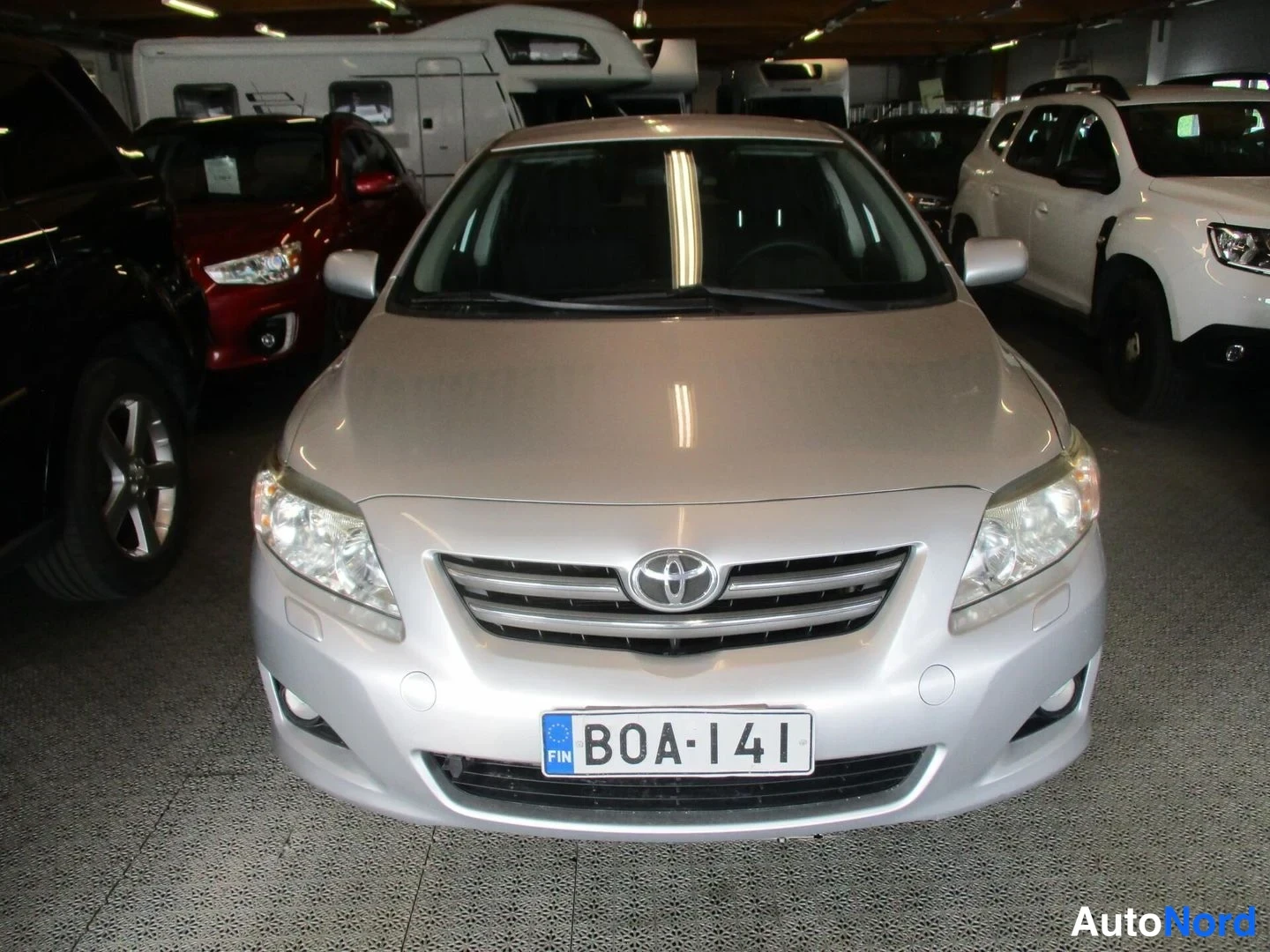 Silver Toyota Corolla 2010, front, photo 3