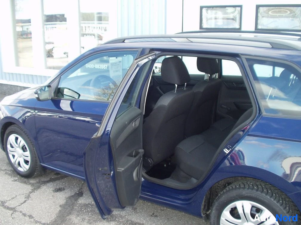 Sininen Skoda Fabia 2016, sivulta, kuva 6