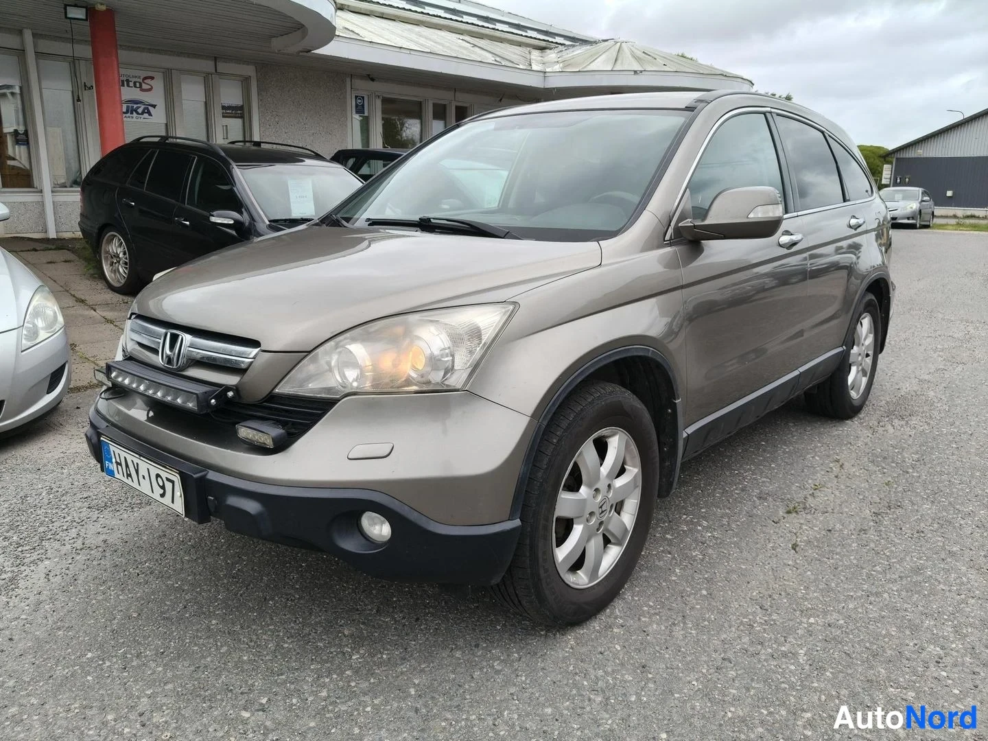 Grey Honda CR-V 2008, front three-quarter, nose to the left, photo 2