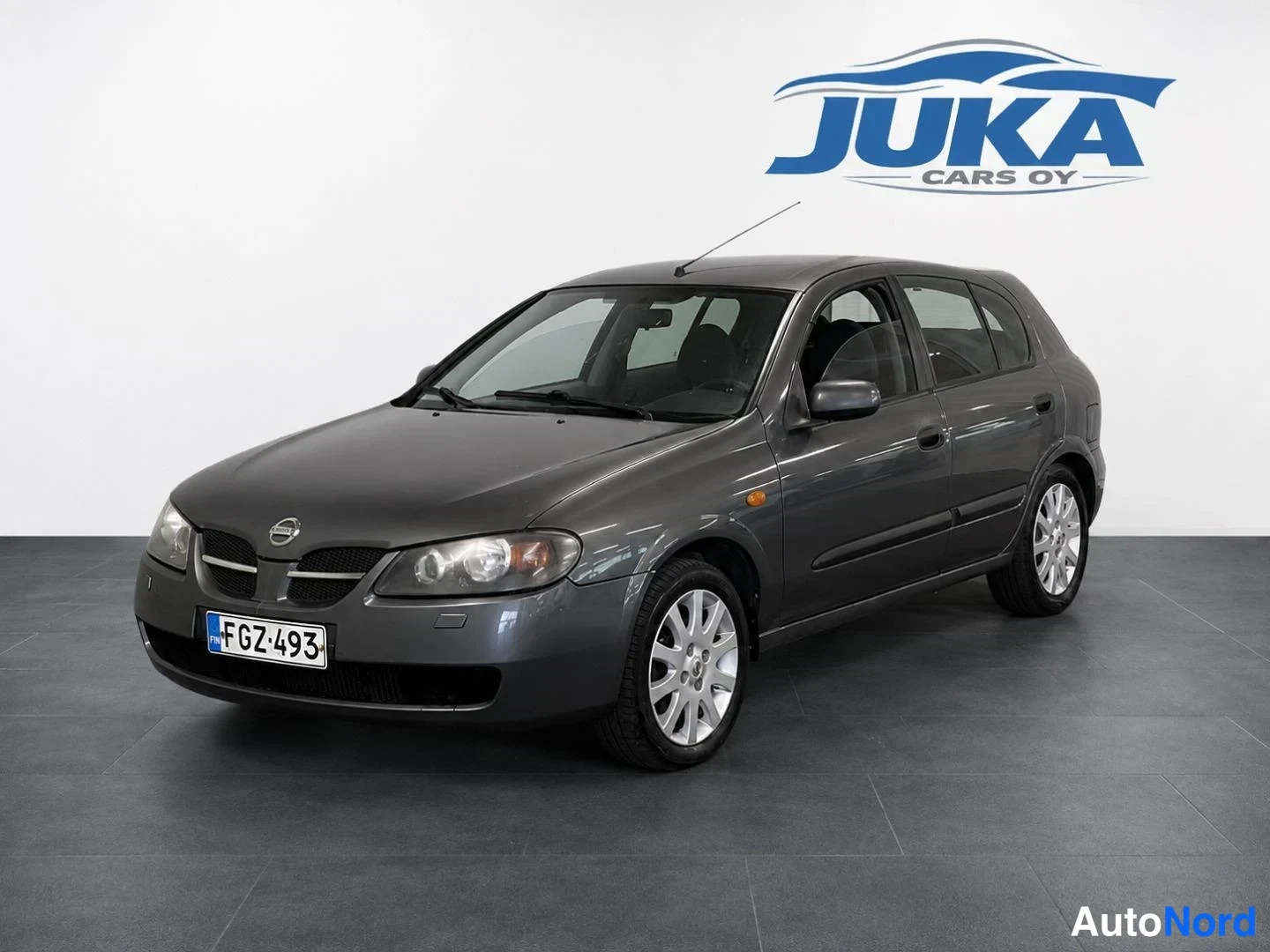 Grey Nissan Almera 2005, front three-quarter, nose to the left, photo 2