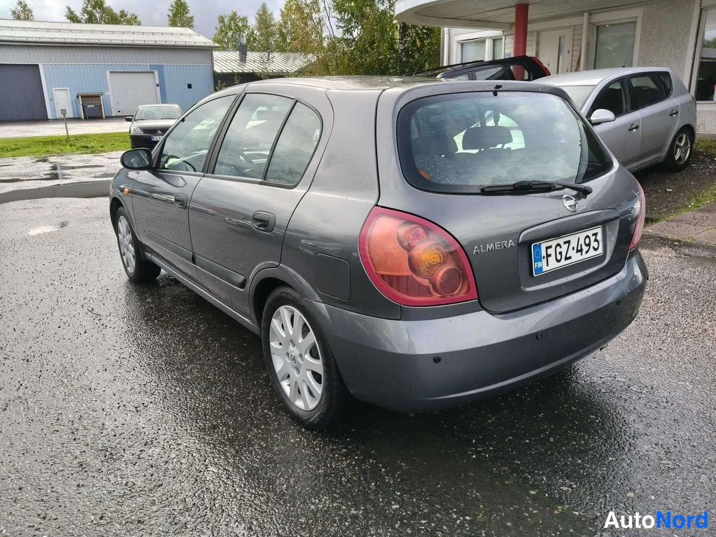 Grey Nissan Almera 2005, rear three-quarter, photo 4