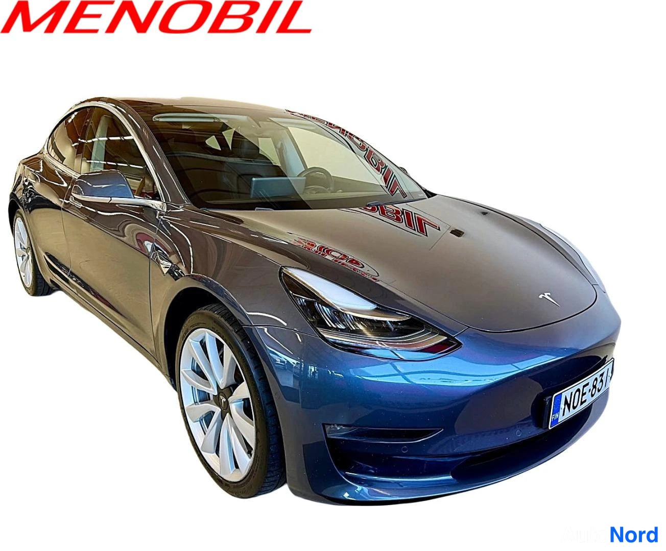 Grey Tesla Model 3 2020, front three-quarter, nose to the right, photo 2