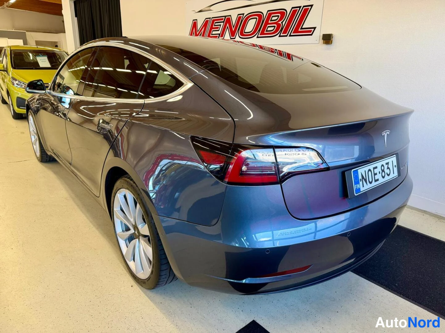Grey Tesla Model 3 2020, rear three-quarter, photo 6