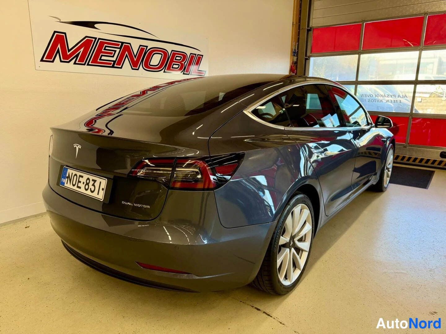 Grey Tesla Model 3 2020, rear three-quarter, photo 7