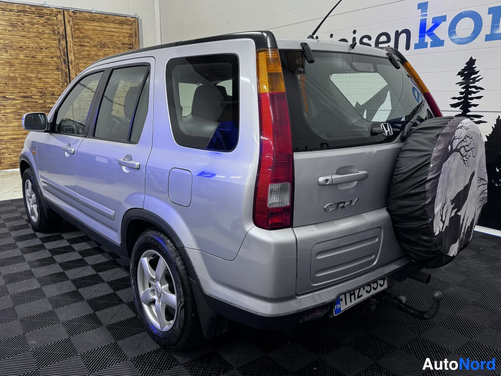 Silver Honda CR-V 2002, rear three-quarter, photo 4