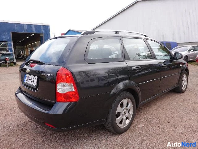 Musta Chevrolet Nubira 2010, takaviisto, kuva 12
