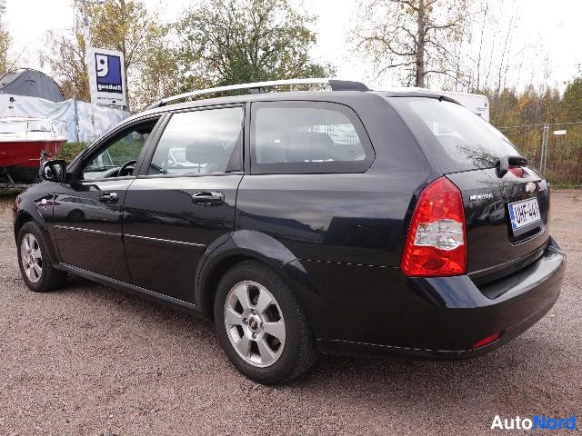 Musta Chevrolet Nubira 2010, takaviisto, kuva 11