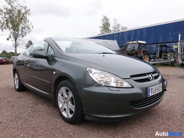 Vihreä Peugeot 307 2004, etuviisto, keula oikealle, kuva 8