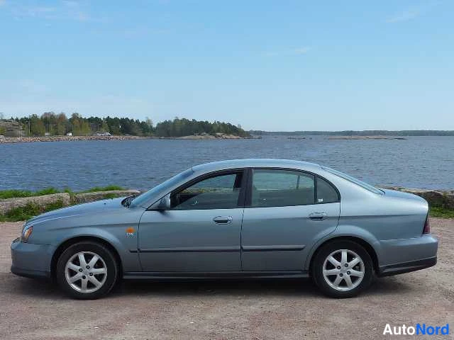 Harmaa Daewoo EVANDA 2003, sivulta, kuva 8