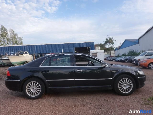 Musta Volkswagen Phaeton 2007, sivulta, kuva 9