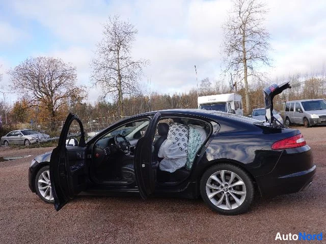 Musta Jaguar XF 2008, takaviisto, kuva 14