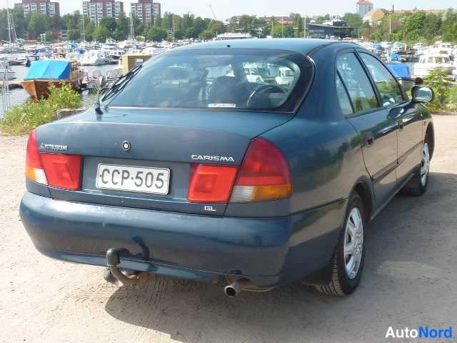 Sininen Mitsubishi Carisma 1998, takaviisto, kuva 17