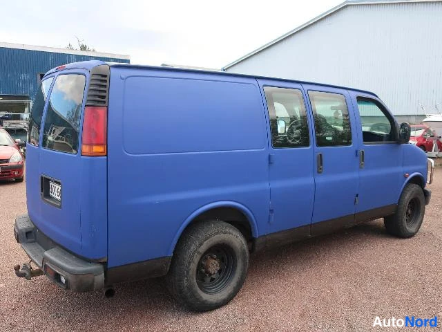 Sininen Chevrolet Chevy Van 1998, takaviisto, kuva 14