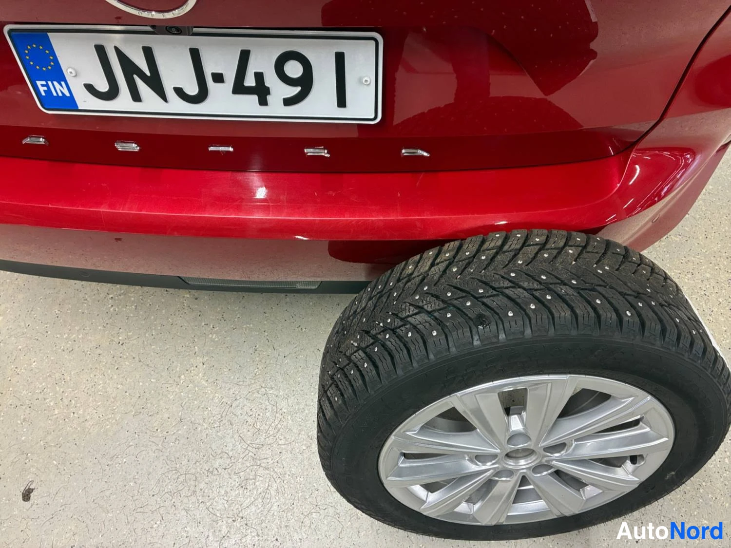 Punainen Opel Astra Sports Tourer 2024, takaa, kuva 9