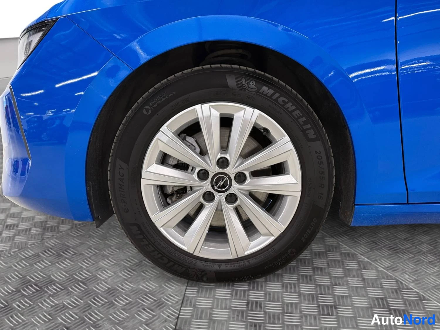 Sininen Opel Astra Sports Tourer 2024, kuva 13