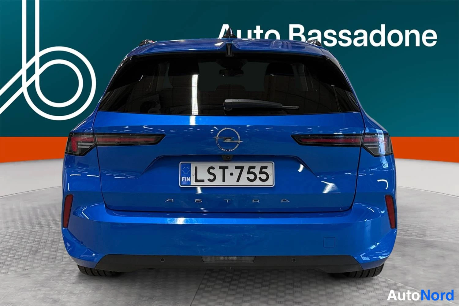 Sininen Opel Astra Sports Tourer 2024, takaa, kuva 8