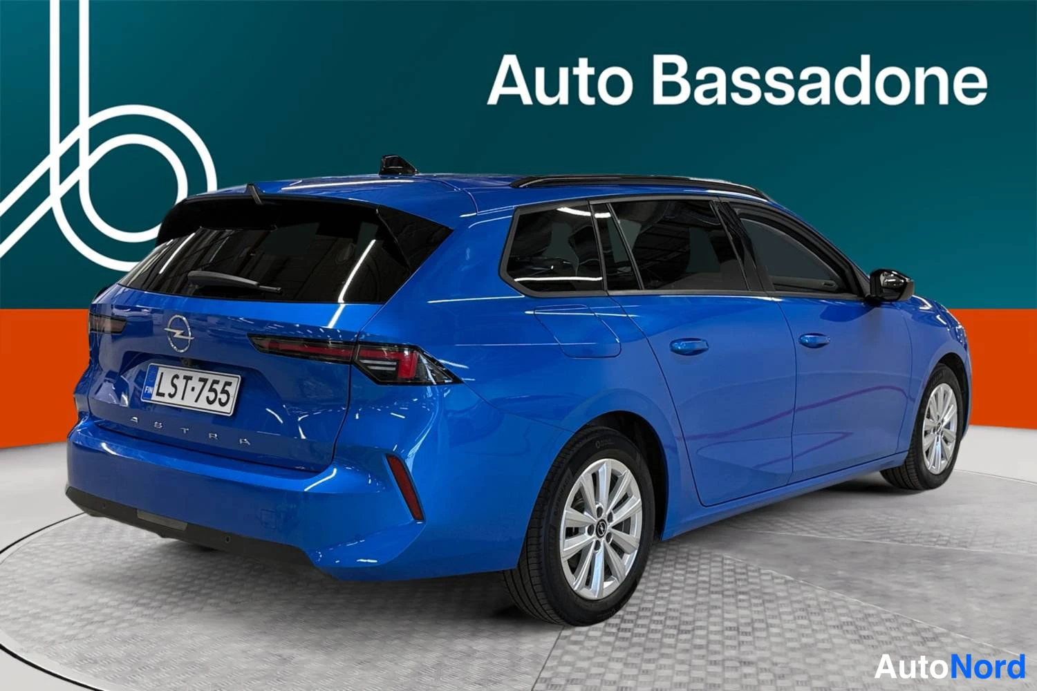 Sininen Opel Astra Sports Tourer 2024, takaviisto, kuva 6