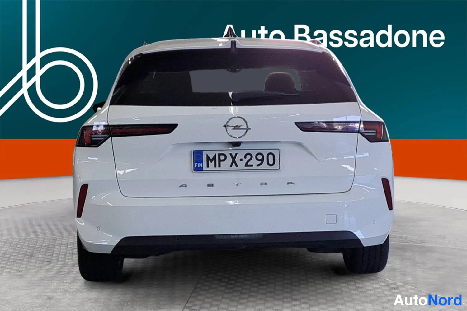 White Opel Astra Sports Tourer 2024, rear, photo 8