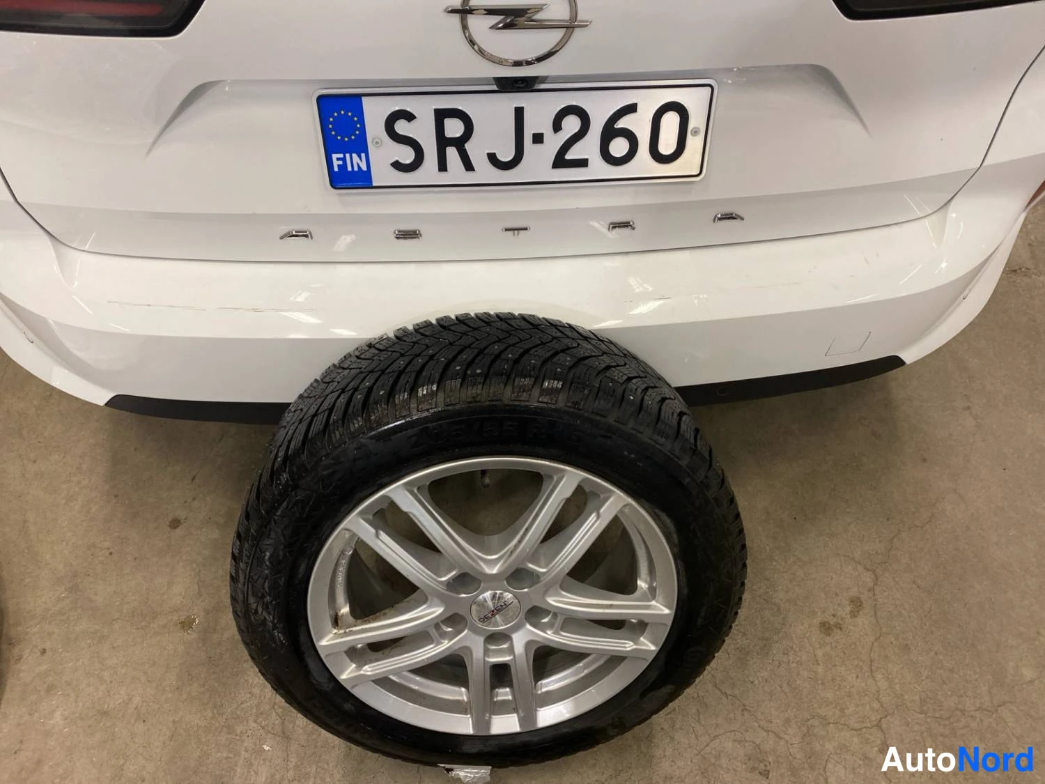 Valkoinen Opel Astra Sports Tourer 2024, takaa, kuva 10