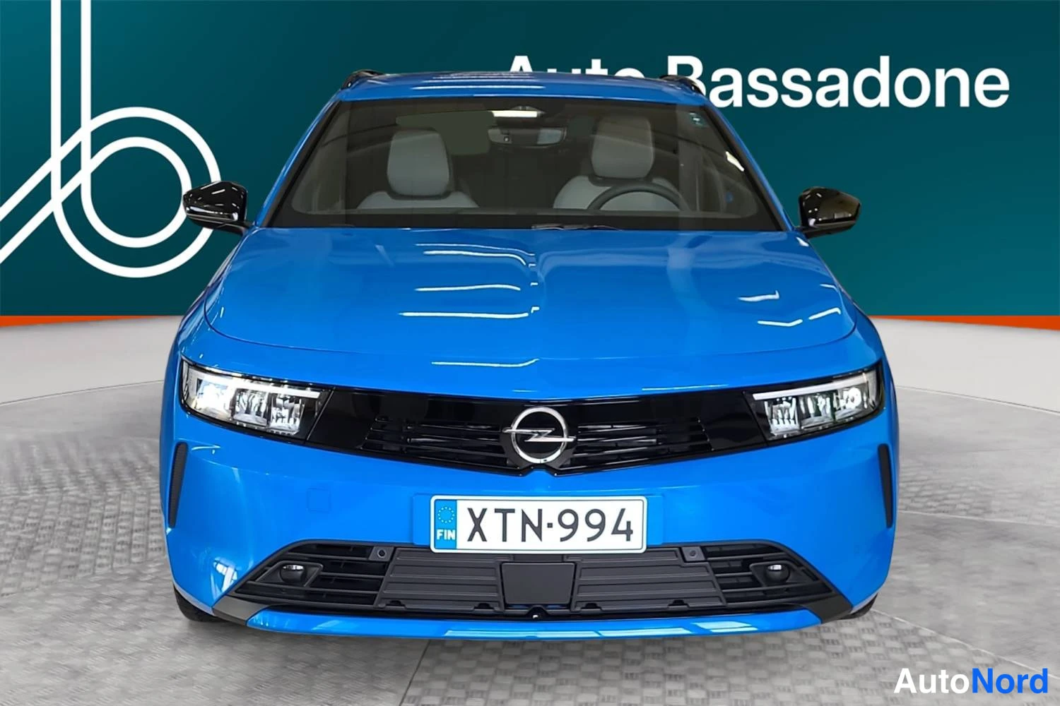 Blue Opel Astra sports tourer 2026, front, photo 3