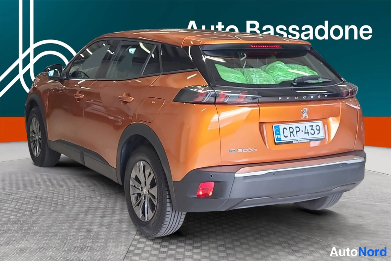 Oranssi Peugeot E-2008 2023, takaviisto, kuva 7
