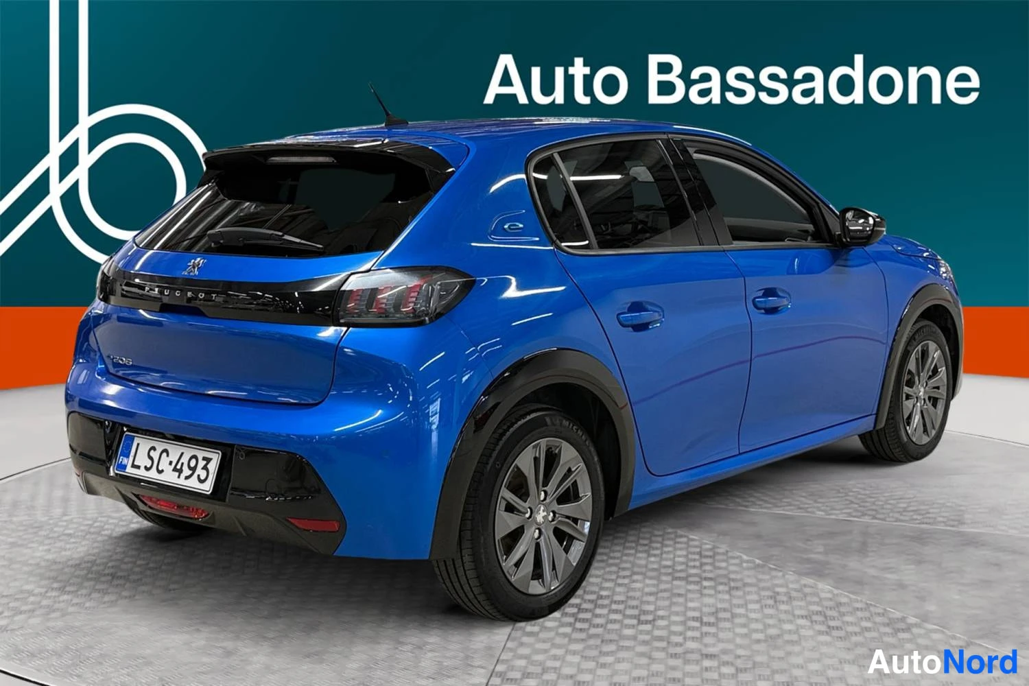 Sininen Peugeot E-208 2023, takaviisto, kuva 7
