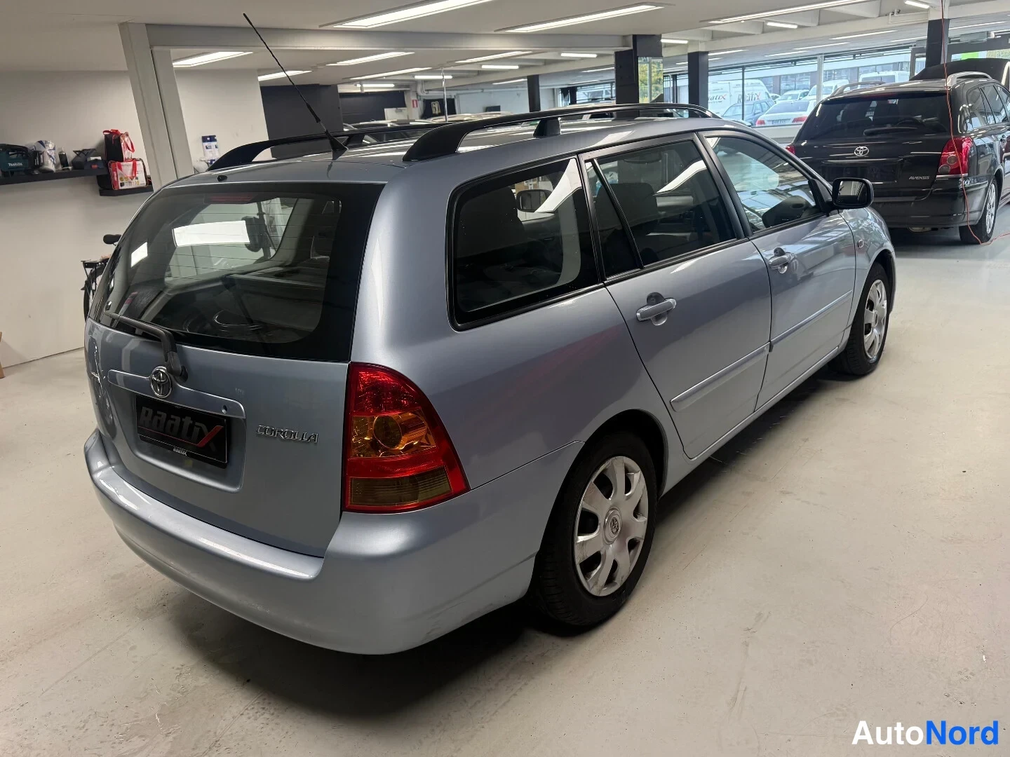 Sininen Toyota Corolla 2004, takaviisto, kuva 5