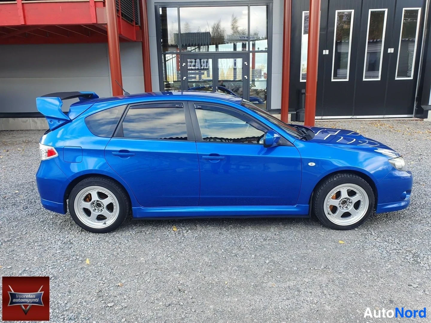 Sininen Subaru Impreza 2008, etuviisto, keula oikealle, kuva 3