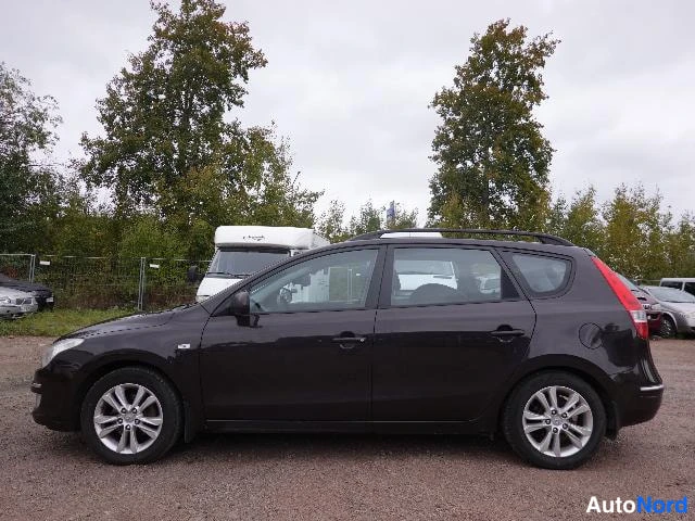 Musta Hyundai i30 2008, sivulta, kuva 8