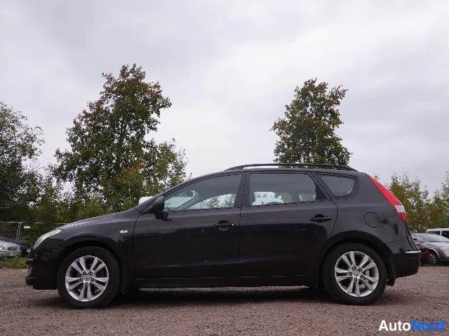 Musta Hyundai i30 2008, etuviisto, keula vasemmalle, kuva 3