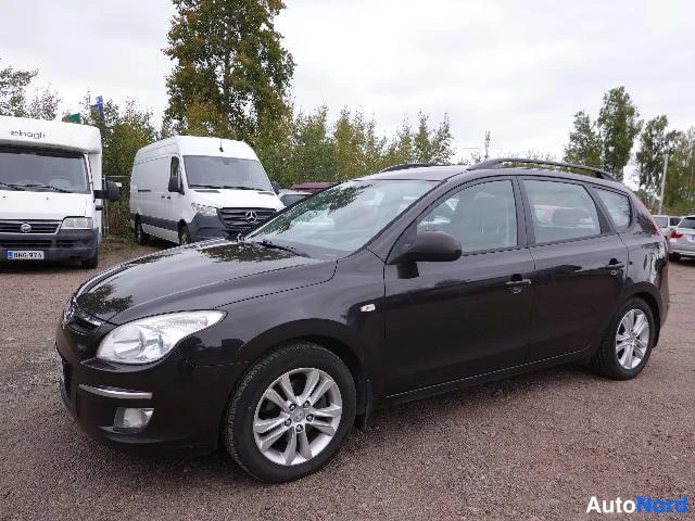 Musta Hyundai i30 2008, etuviisto, keula vasemmalle, kuva 2