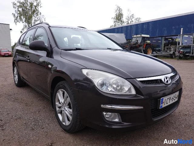 Musta Hyundai i30 2008, etuviisto, keula oikealle, kuva 5