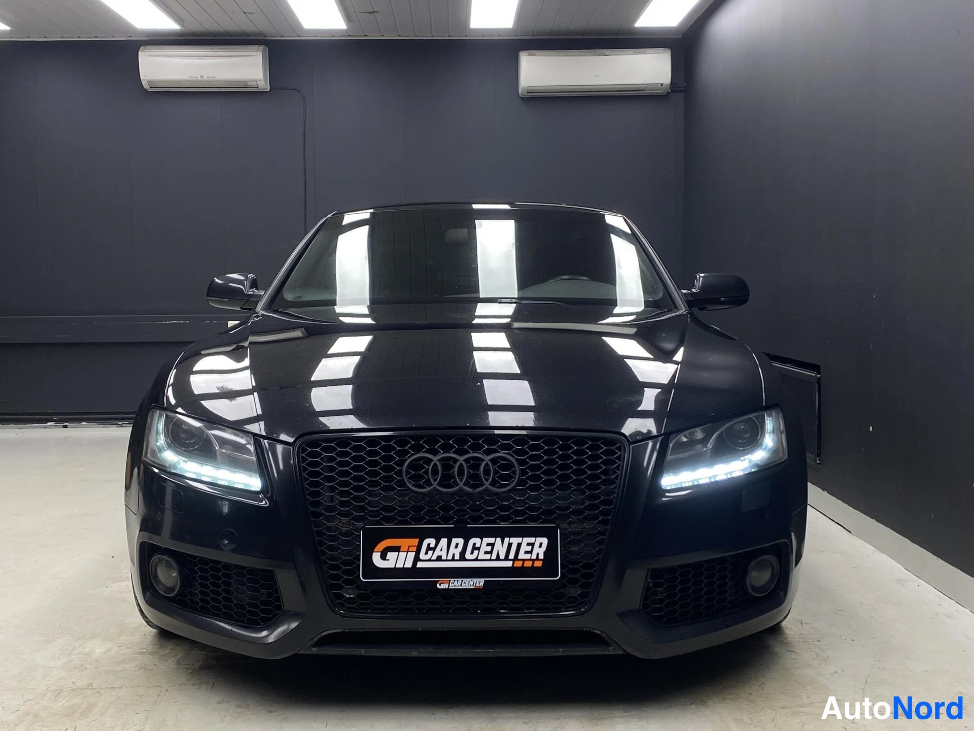 Musta Audi A5 2010, edestä, kuva 4