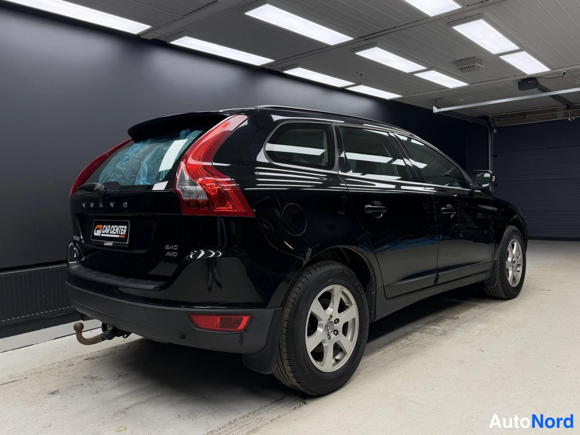 Musta Volvo XC60 2009, takaviisto, kuva 8