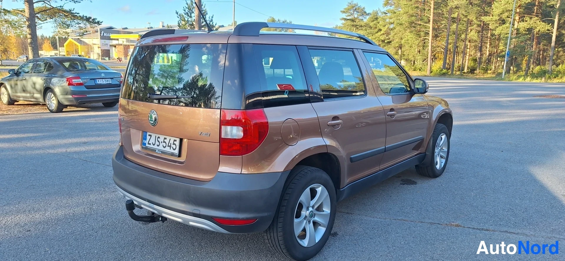 Oranssi Skoda Yeti 2012, takaviisto, kuva 6
