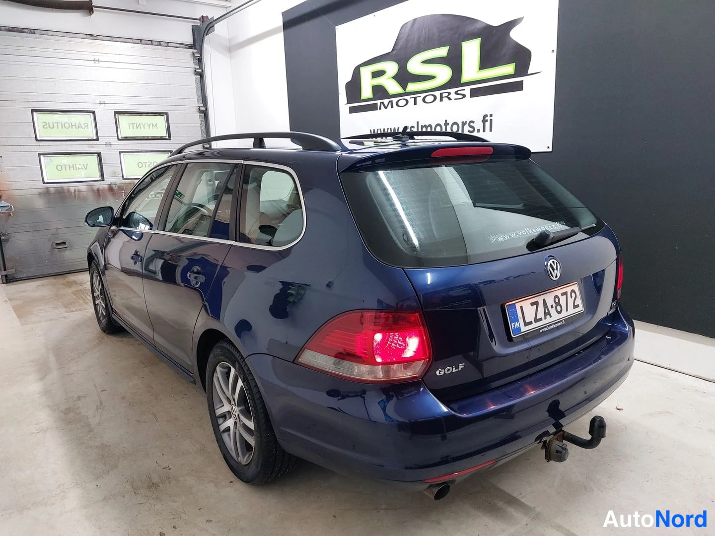 Sininen Volkswagen Golf 2010, takaviisto, kuva 7