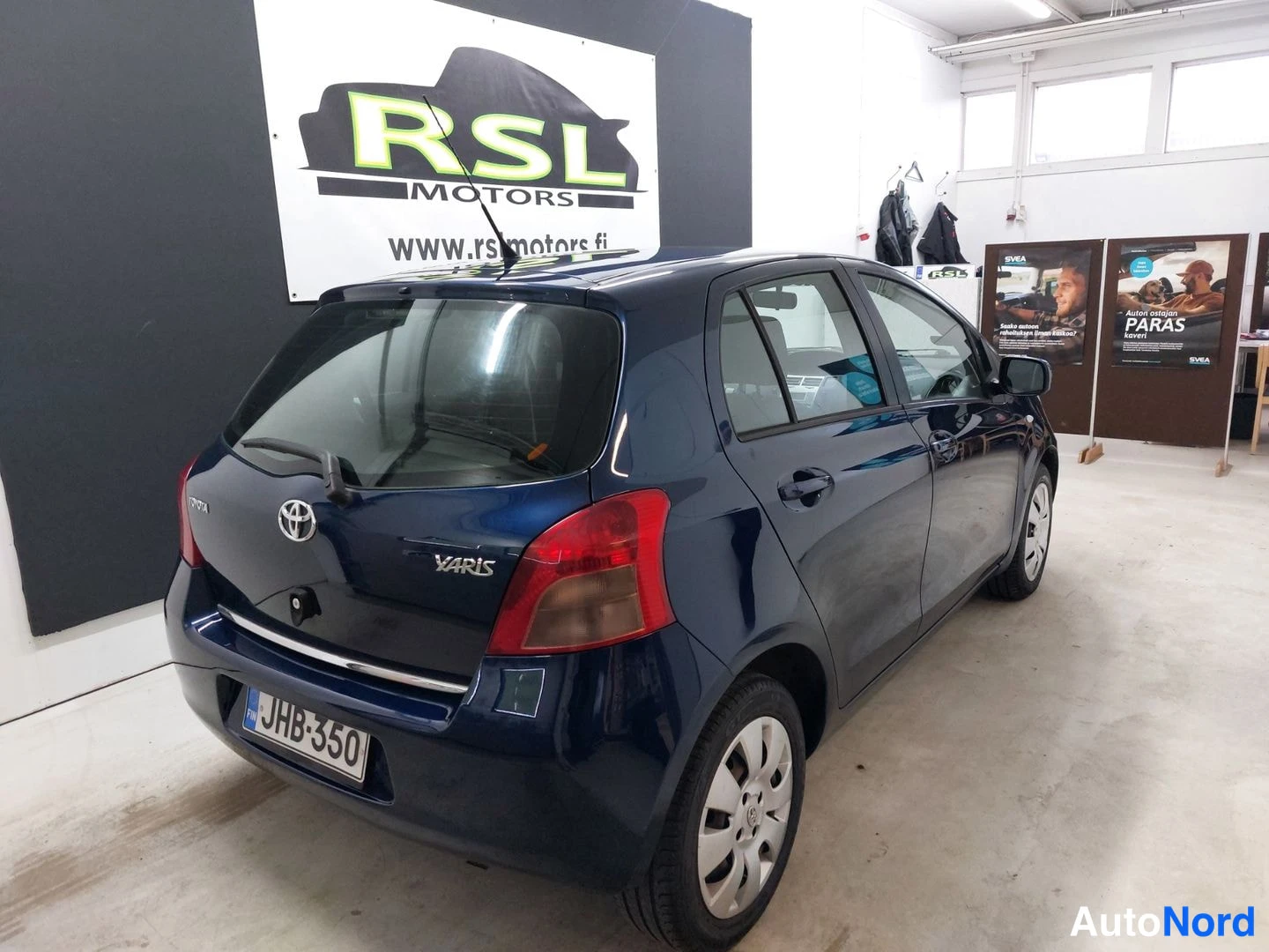 Sininen Toyota Yaris 2007, takaviisto, kuva 6