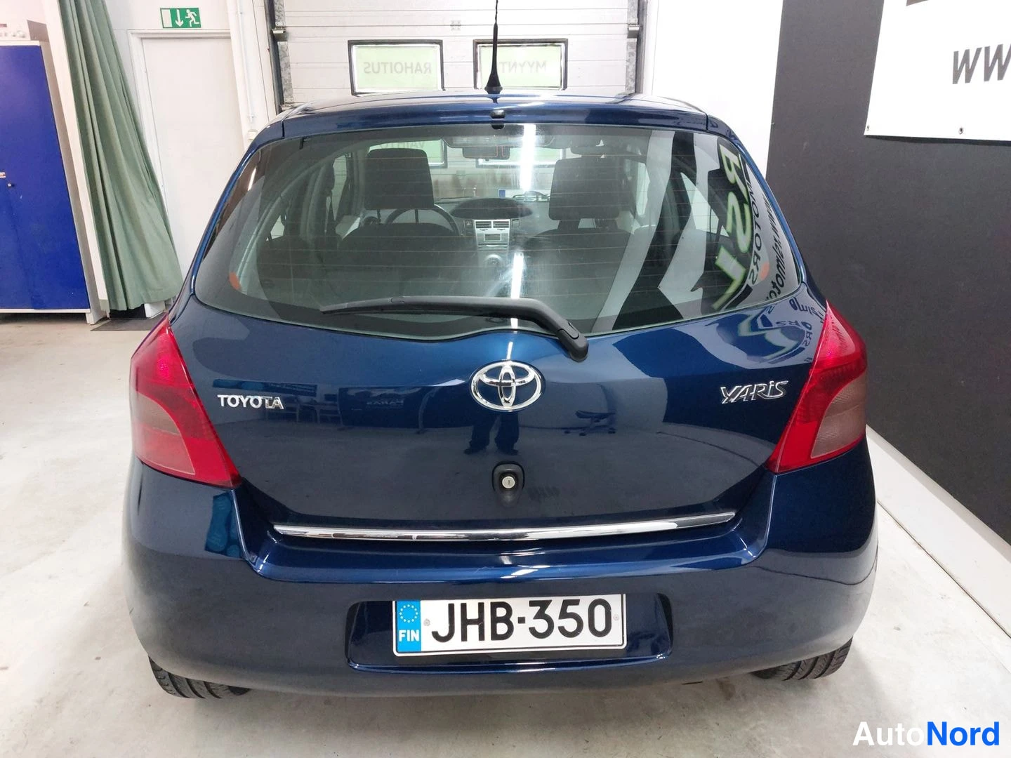 Sininen Toyota Yaris 2007, takaa, kuva 9