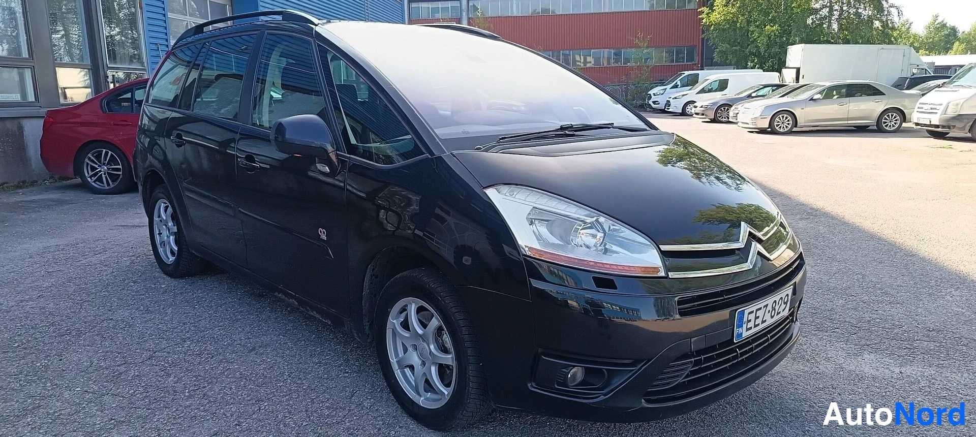 Musta Citroen Grand C4 Picasso 2009, etuviisto, keula oikealle, kuva 3