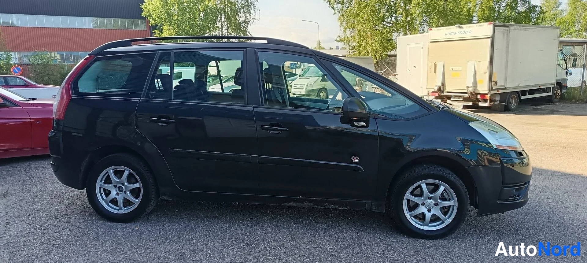 Musta Citroen Grand C4 Picasso 2009, sivulta, kuva 4