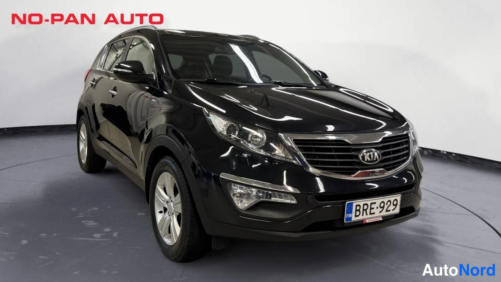 Musta Kia Sportage 2013, etuviisto, keula oikealle, kuva 3