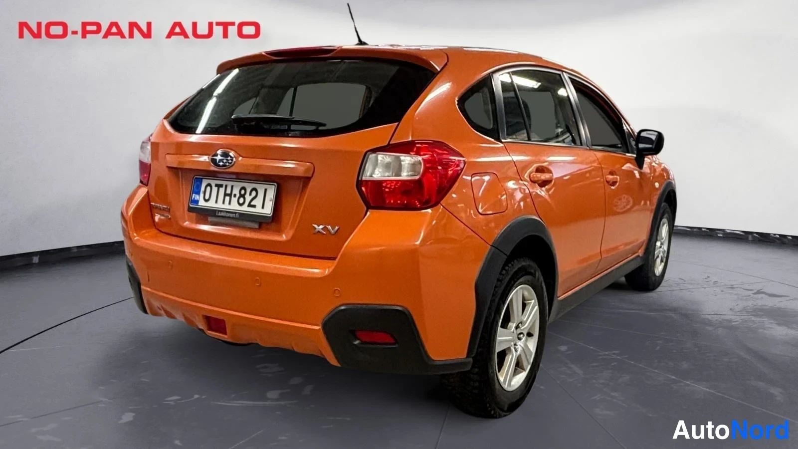Oranssi Subaru XV 2012, takaviisto, kuva 7